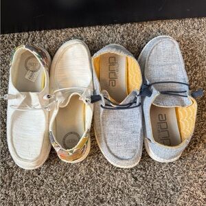 2 pair of women’s size 9M HEY DUDE slip on shoes.  White and blue!!